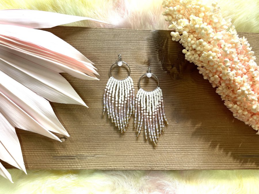 A pair of beaded fringe earrings.