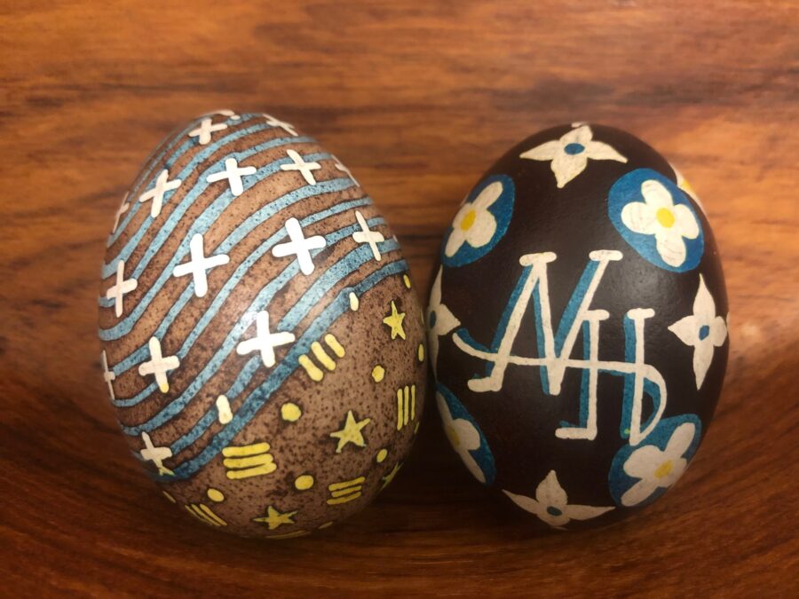 Two Ukrainian Easter eggs on a table.