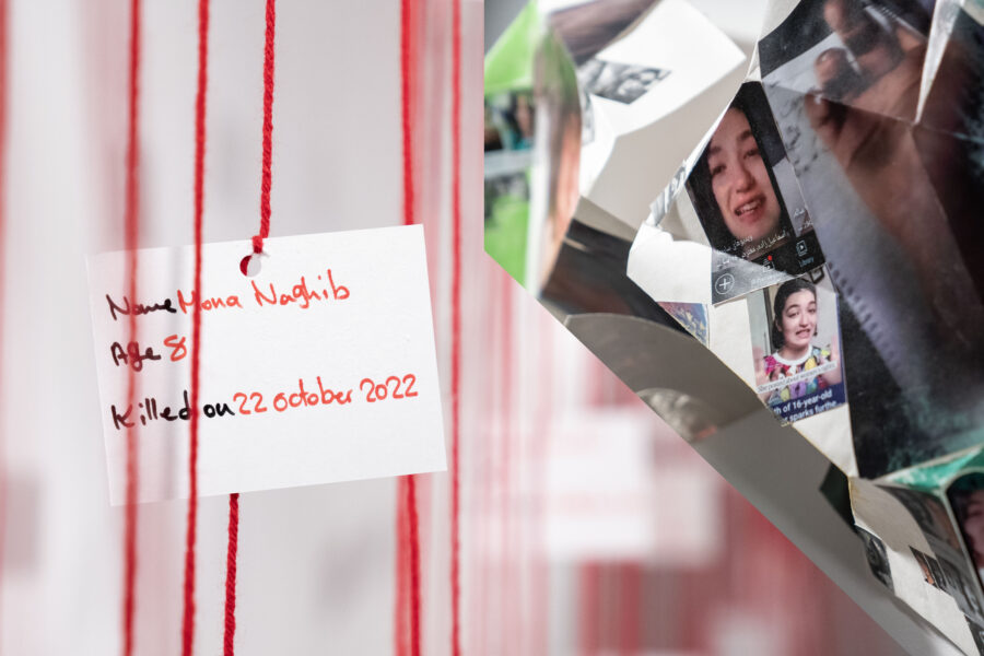A tag with a girl's name, her age and the date she was killed hangs on a red thread. Next to it is a collage showing pictures of a young girl.