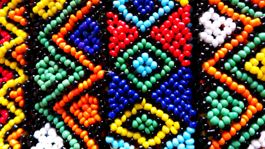Colourful beaded strips with geometric patterns.