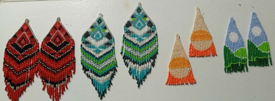 Four sets of earrings by Karen Smith.