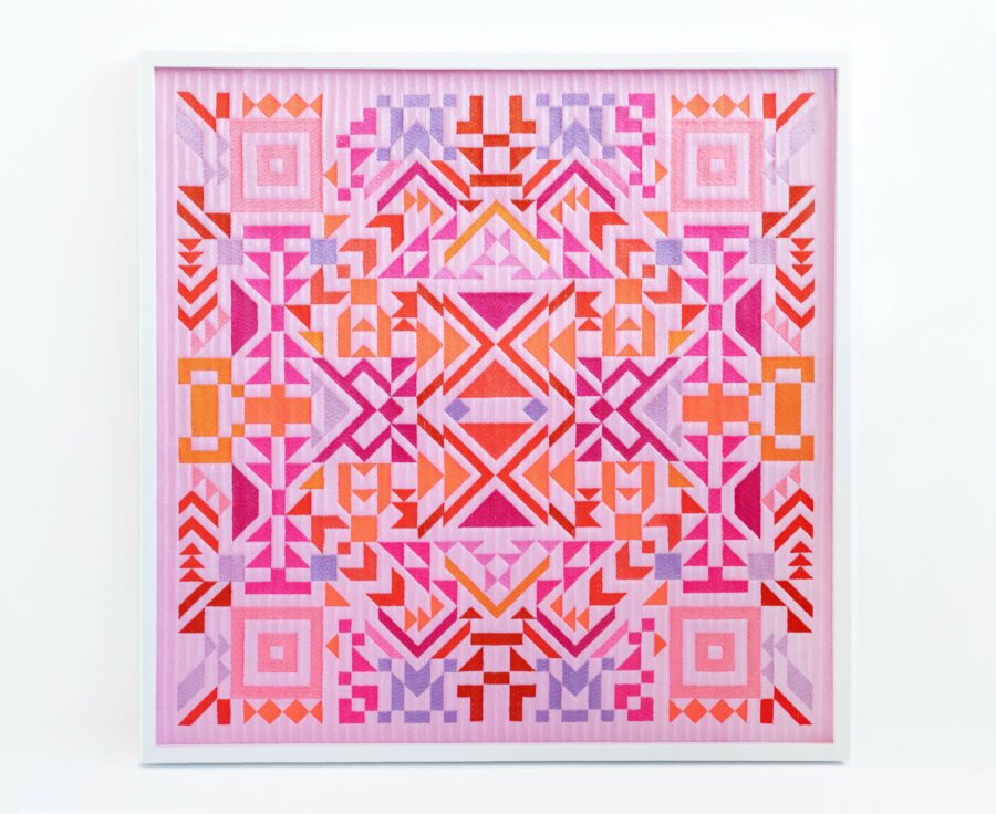 Artwork by Caroline Monnet. A geometric design similar to a quilt in pinks, orange and blue.