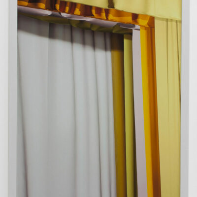 Photograph by Ashley Gillanders of overlapping white and yellow curtains.