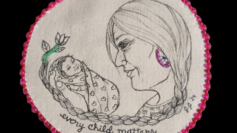 A drawing on a circular piece of canvas of an older woman's face looking at a baby wrapped in a blanket with the words 'every child matters'. The canvas is edged with pink beads.