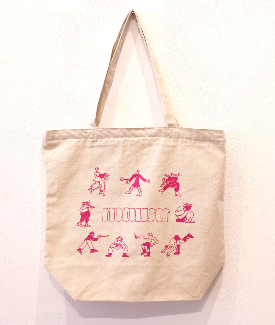 Neutral coloured tote cotton tote bag with an illustration by Cato Cormier in bright pink in of 8 cartoonish figures each engaged in a different art activity in a circle around MAWA's logo.